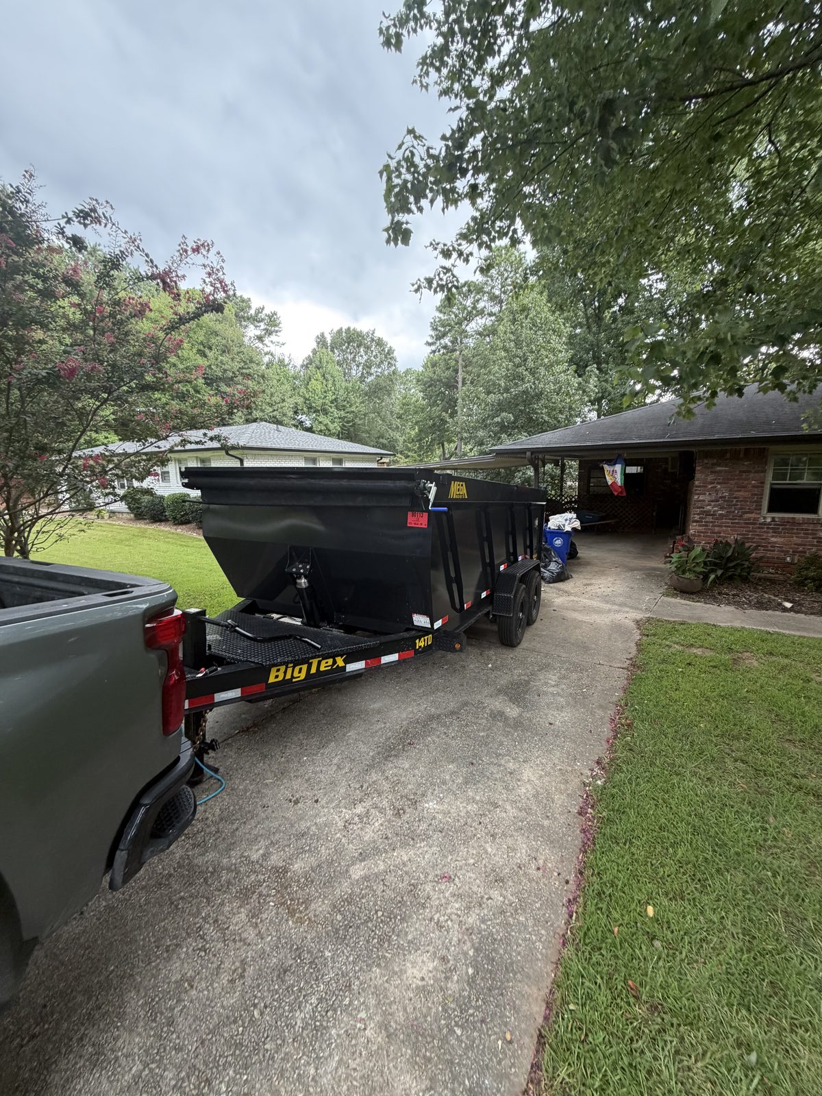 Dumpster in the driveway
